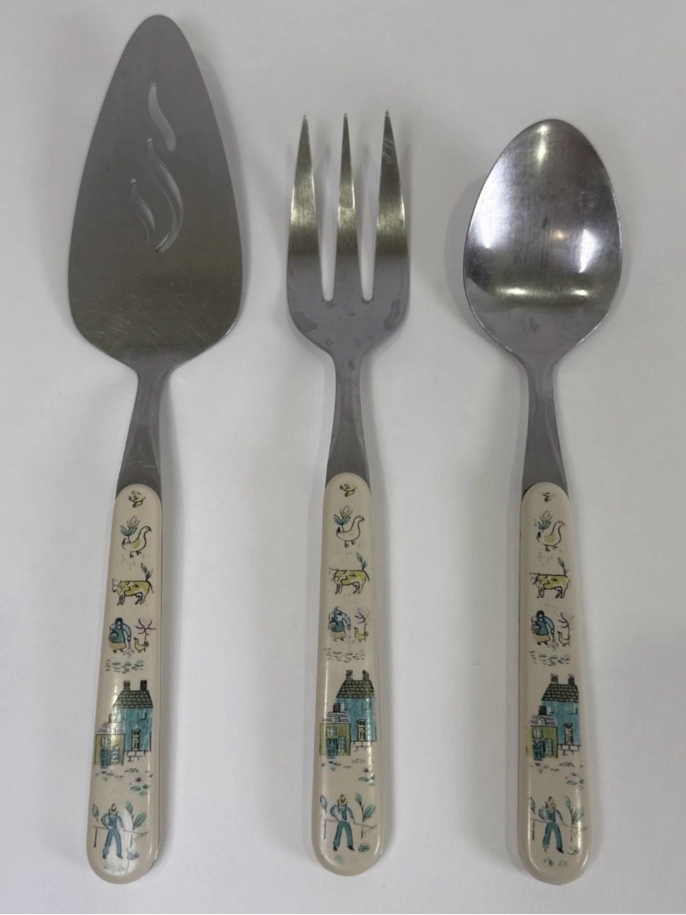 Heartland International 3 Pc Serving Set Fork Spoon Pie Server Folk Art Stainles